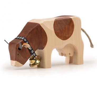 Trauffer Holzkuh fressend Red-Holstein